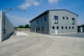 Bosch Beton - Keerwanden als terreinafscheiding en geluidswand bij Containerdienst und Schrotthandel GmbH in Fockbek