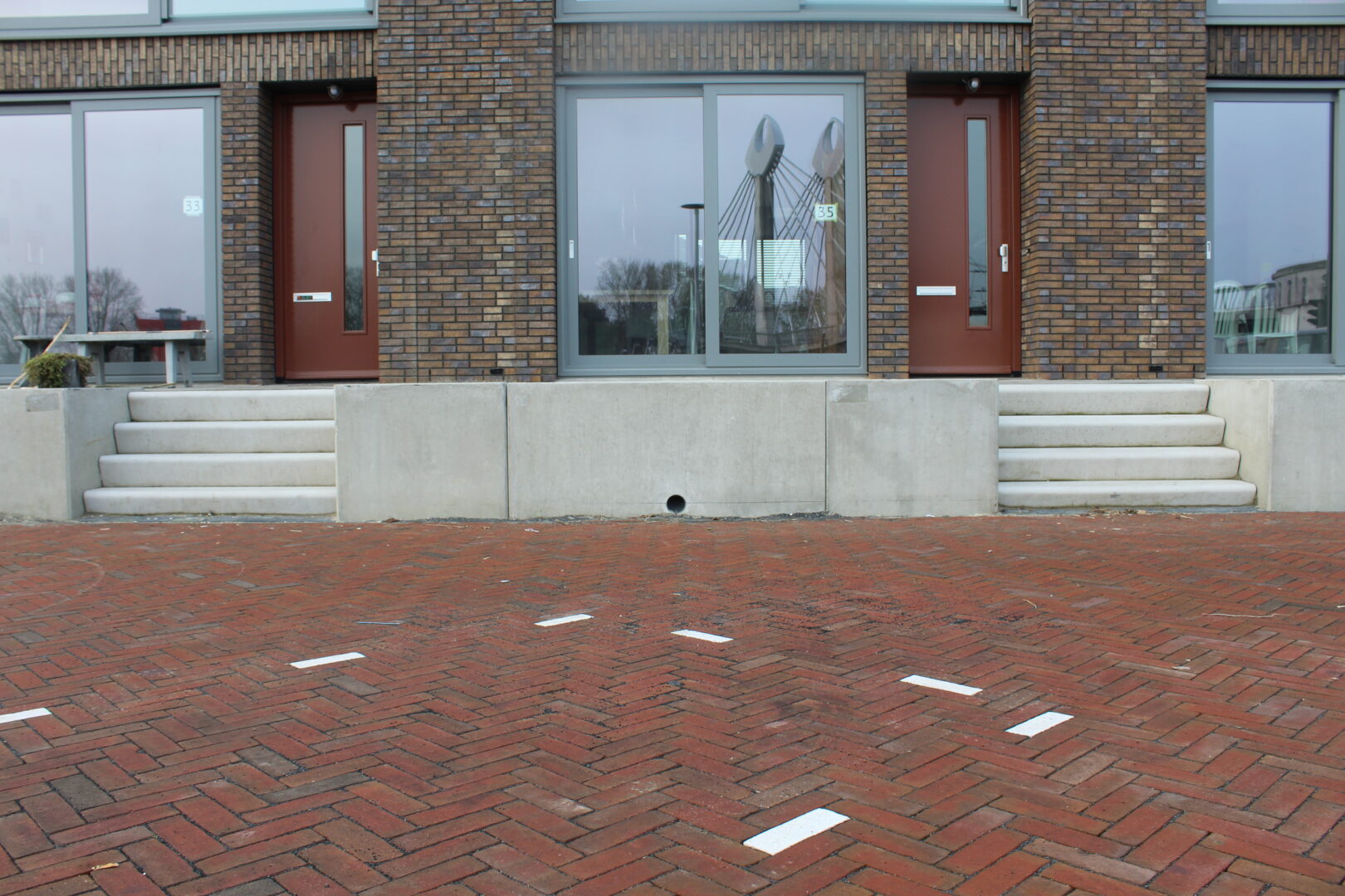 Bosch Beton - Verhoogd terras van keerwanden bij kadewoningen in Zwolle Stadshagen